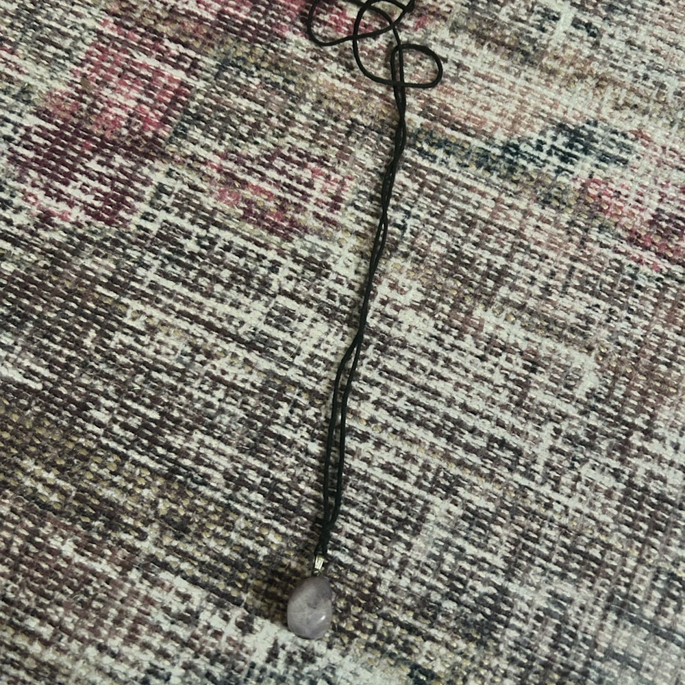 Elegant Black Necklace with Purple Pendant